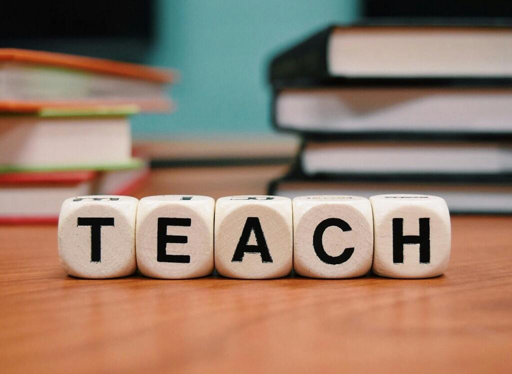 Picture of letter blocks spelling "TEACH"